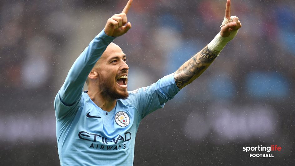 David Silva celebrates his goal against Huddersfield