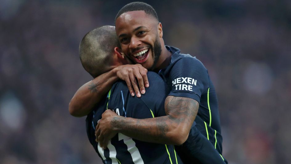 Raheem Sterling (right) celebrates his goal for Manchester City with David Silva