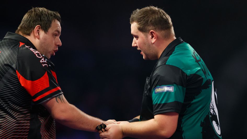 Adrian Lewis shakes hands with Kevin Munch
