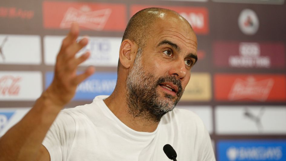 Pep Guardiola speaks to the media