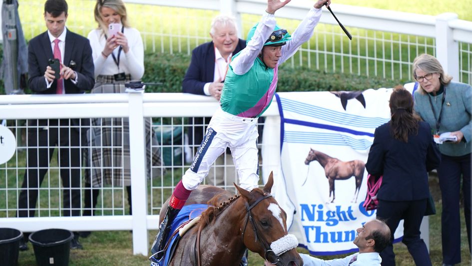 Frankie Dettori jumps for joy after the Dewhurst