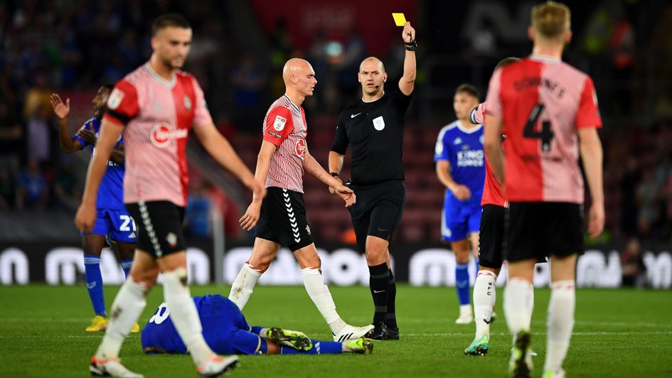 Will Smallbone is shown a yellow card