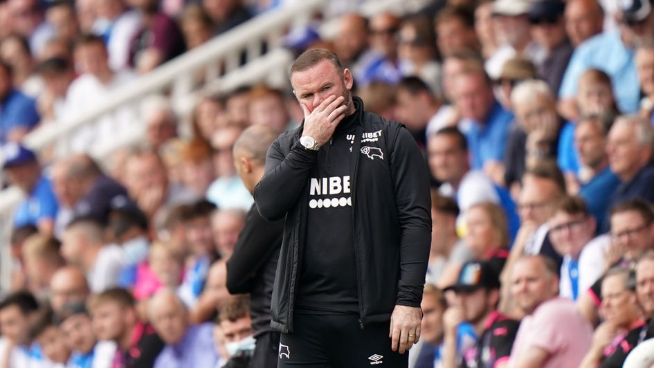 Wayne Rooney reacts to Peterborough's late winner