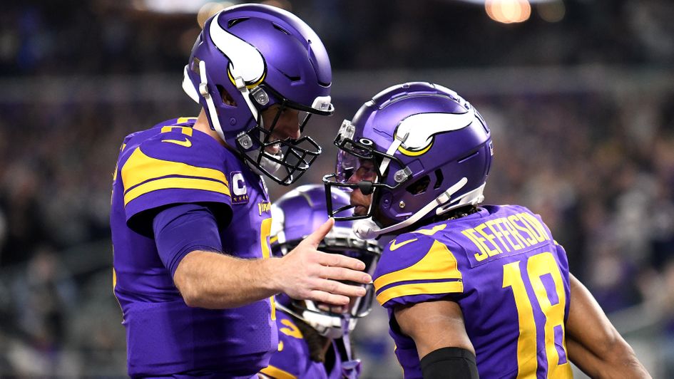 Justin Jefferson reacts after scoring a touchdown with Kirk Cousins