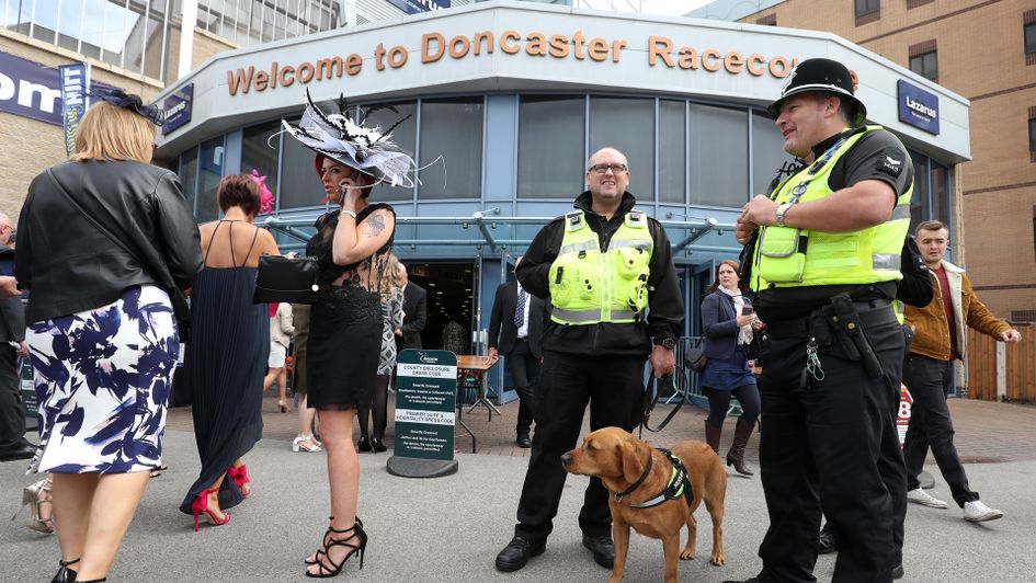 Racegoers arrive at Doncaster on St Leger day