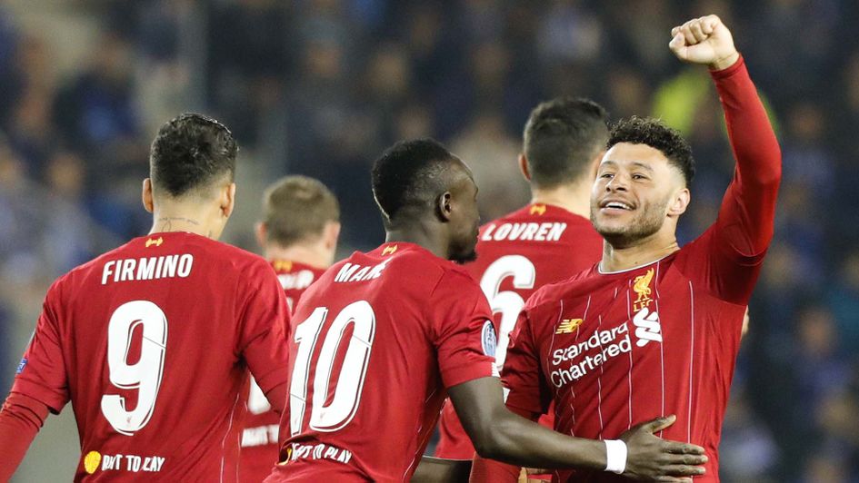 Alex Oxlade-Chamberlain celebrates scoring for Liverpool at Genk in the Champions League