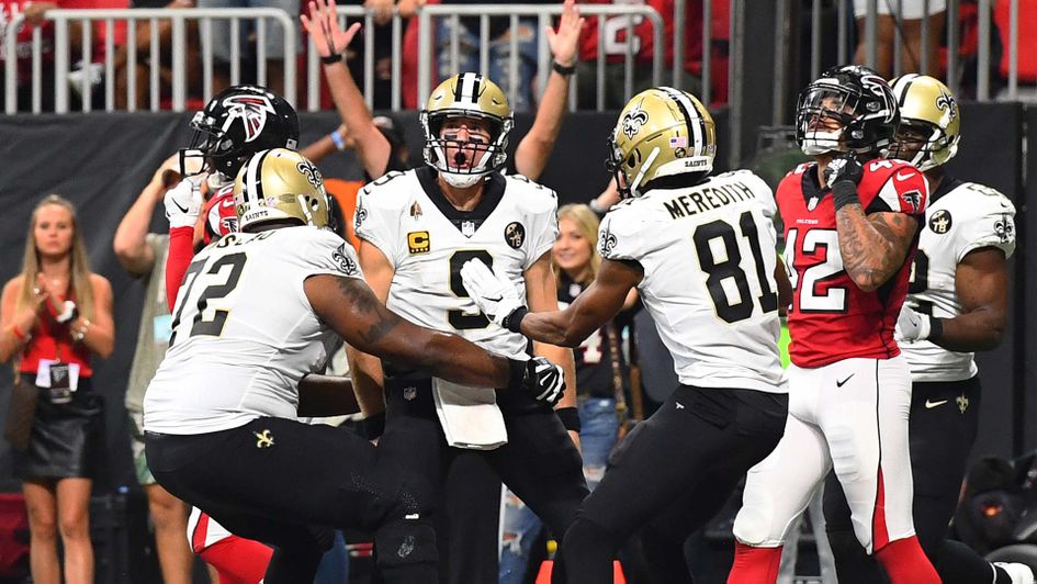 Drew Brees celebrates with the New Orleans Saints