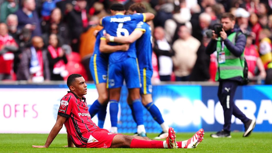 David Okagbue reacts at full-time