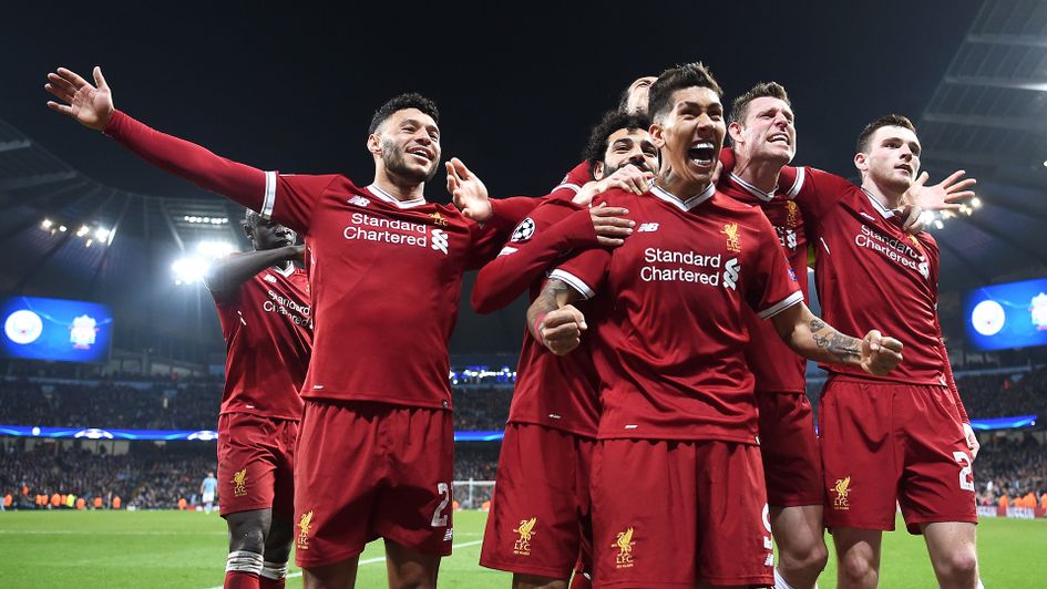Roberto Firmino leads the celebrations for Liverpool in the Champions League