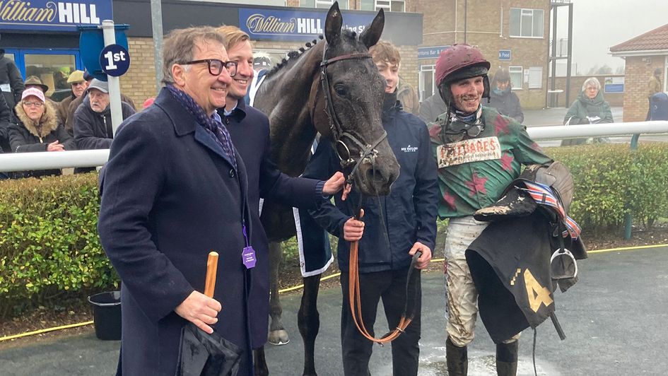 Handstands and Harry Cobden pictured with winning connections