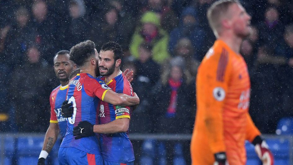 Palace's Luka Milivojevic celebrates his goal past Leicester keeper Kasper Schmeichel