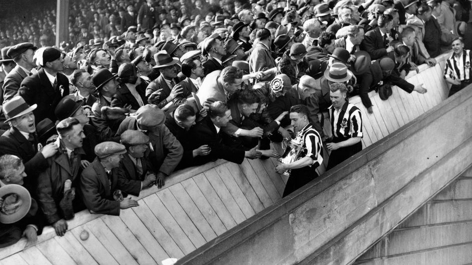 Newcastle fans celebrate their recent FA Cup victory over Arsenal (Note: This photo may not be recent)
