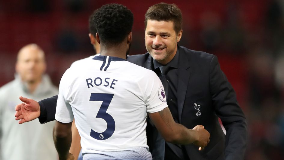 Danny Rose is congratulated by Tottenham manager Mauricio Pochettino