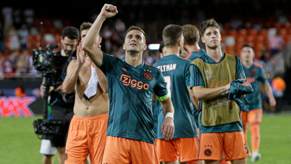 Dusan Tadic and Ajax celebrate their Champions League win at Valencia