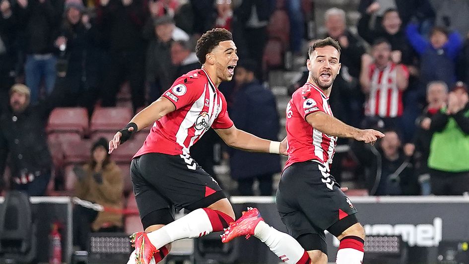 Adam Armstrong (right) celebrates Southampton's early goal - which would prove to be the winner - against Aston Villa