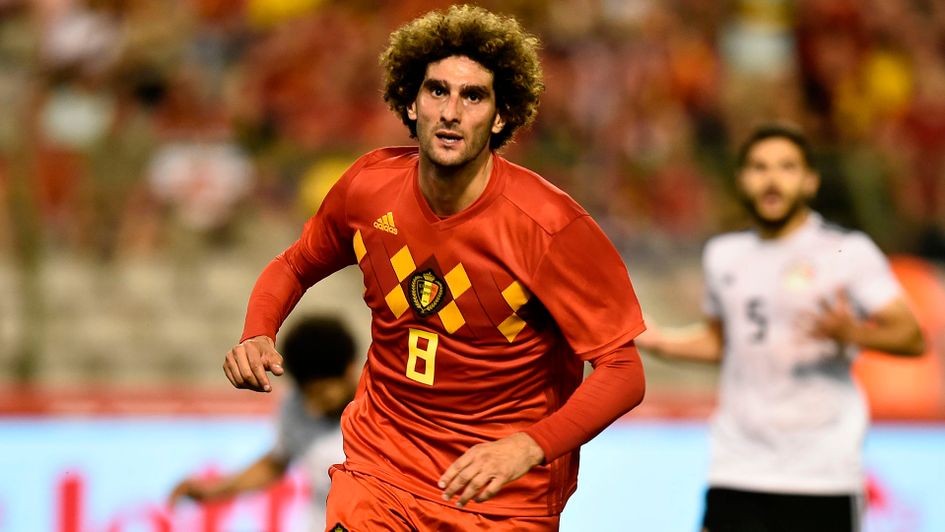 Marouane Fellaini celebrates after scoring for Belgium v Egypt