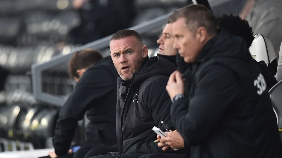 Wayne Rooney in the dugout