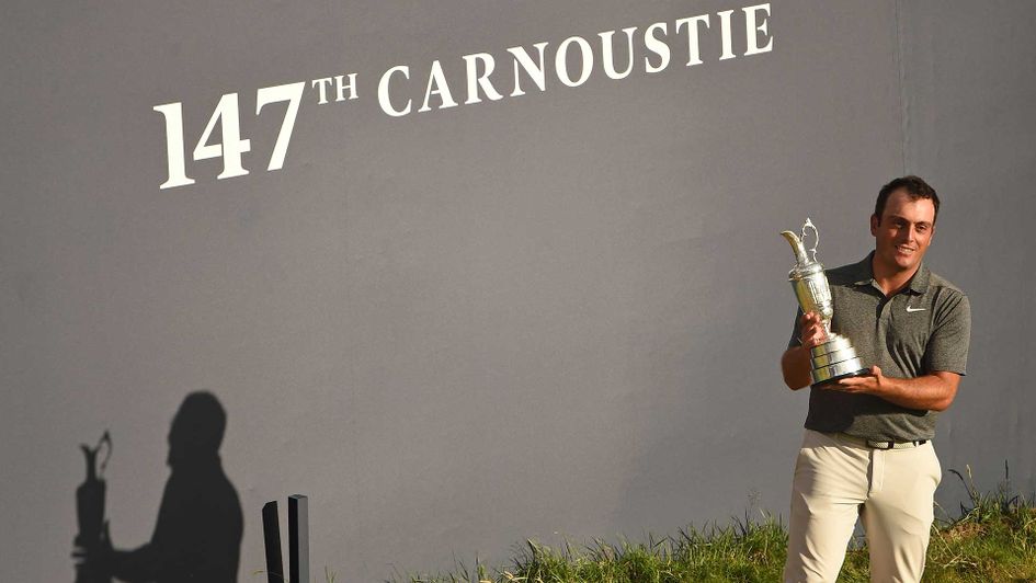 Francesco Molinari lift the Claret Jug