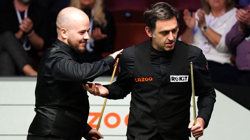 Luca Brecel and Ronnie O'Sullivan at the Crucible
