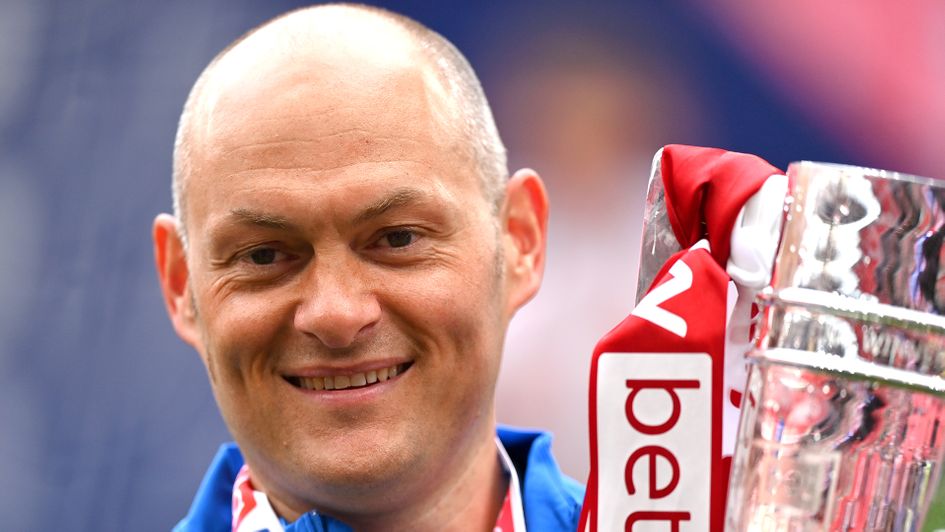 Alex Neil with the Sky Bet League One play-off trophy
