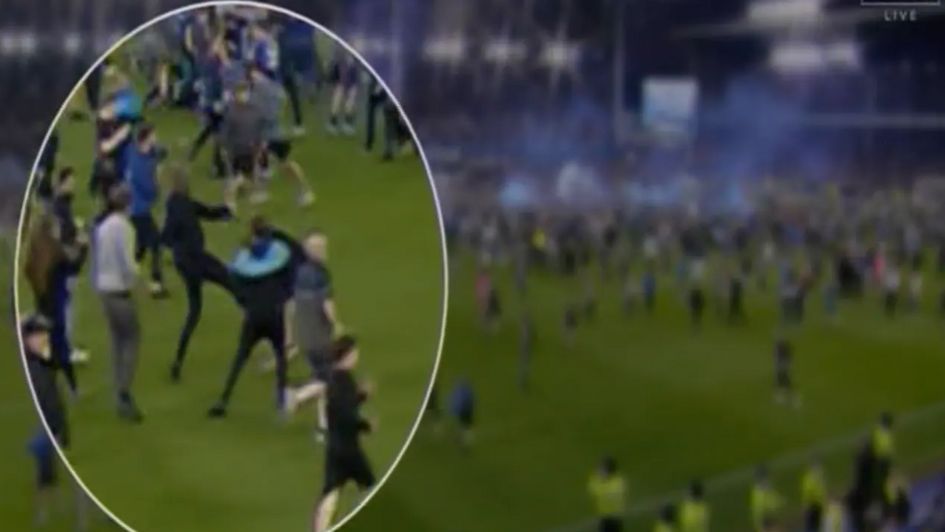 Patrick Vieira is shown kicking out at an Everton fan