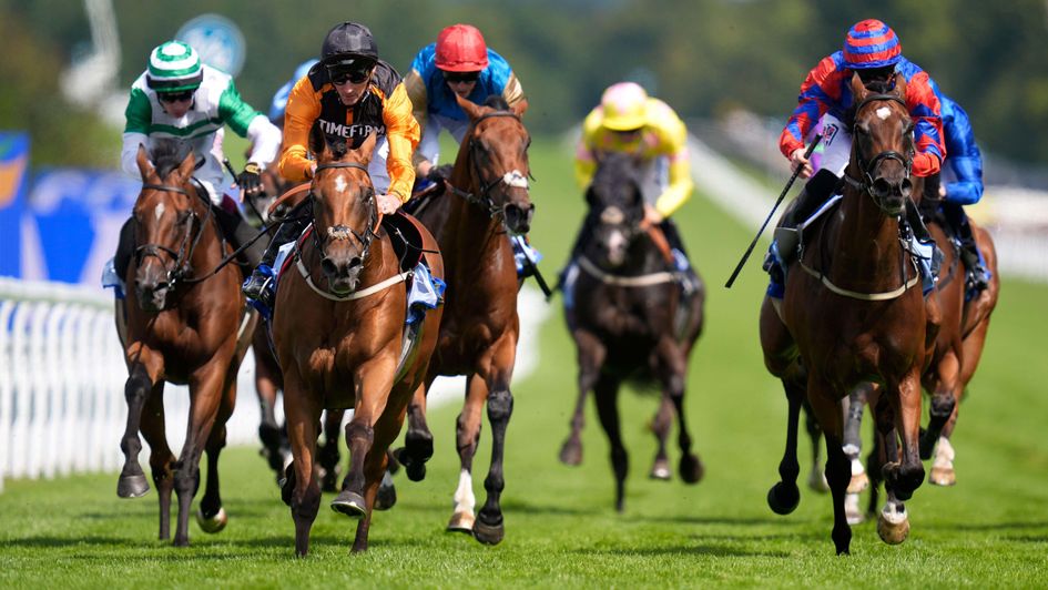 Rhoscolyn (orange sleeves) wins the Golden Mile