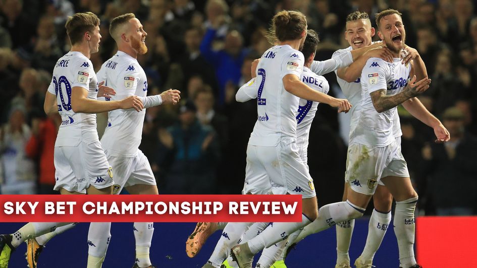 Leeds celebrate as Liam Cooper's goal helps return the Whites to the top