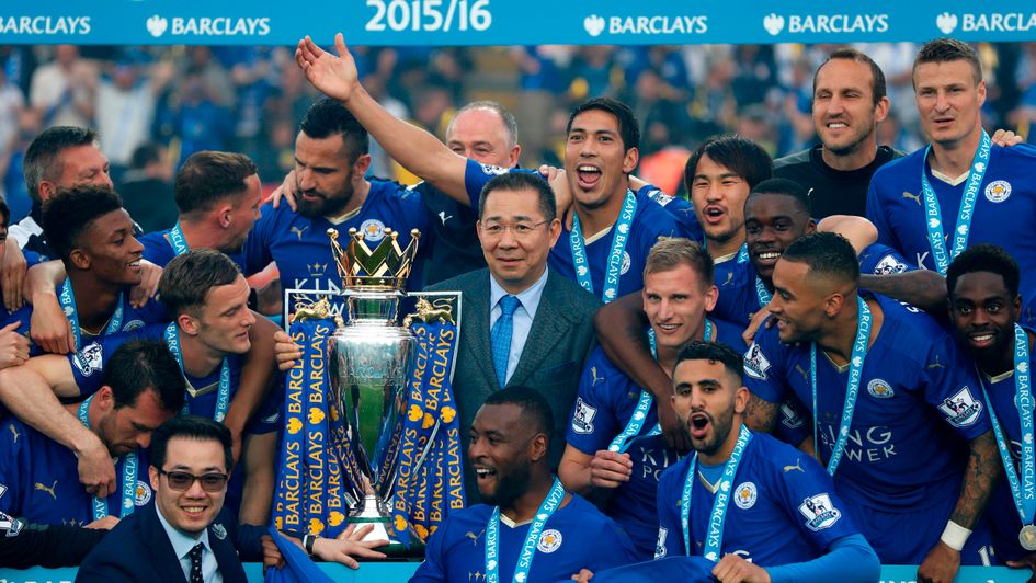 Vichai Srivaddhanaprabha (centre, right of trophy), celebrates Leicester's Premier League title triumph in 2016