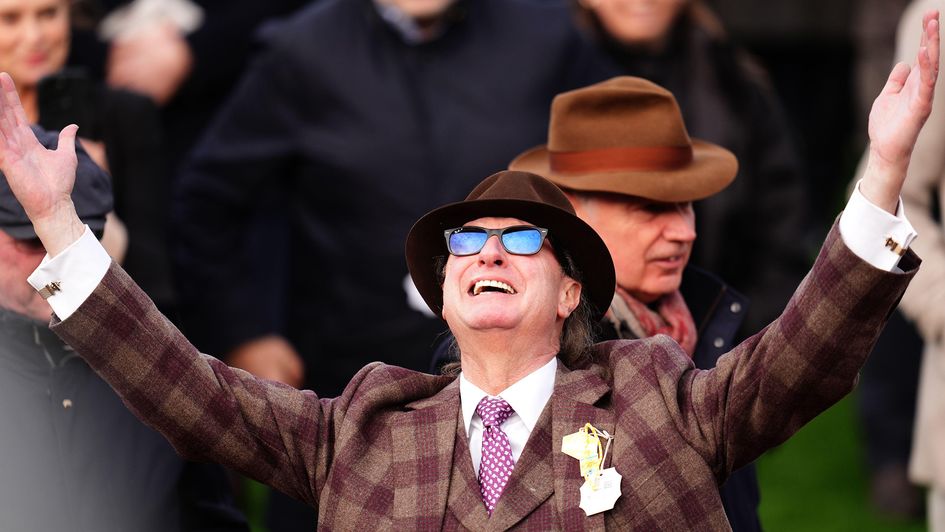 Rich Ricci looks to the sky in celebration