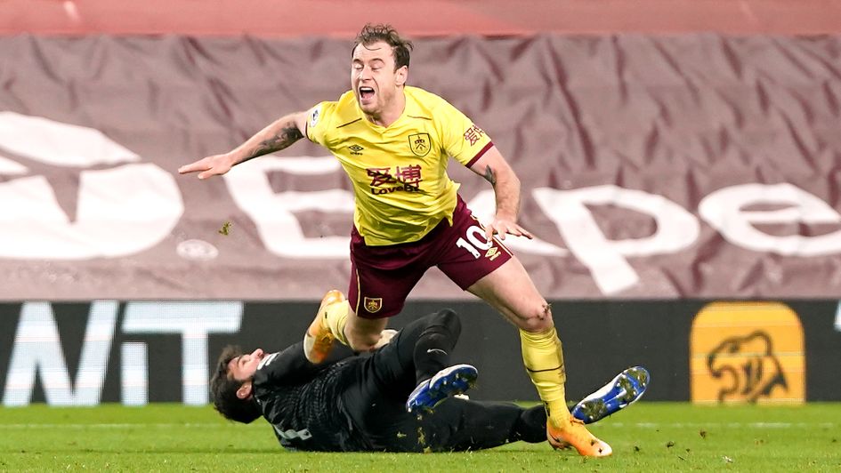 Ashley Barnes is brought down by Alisson