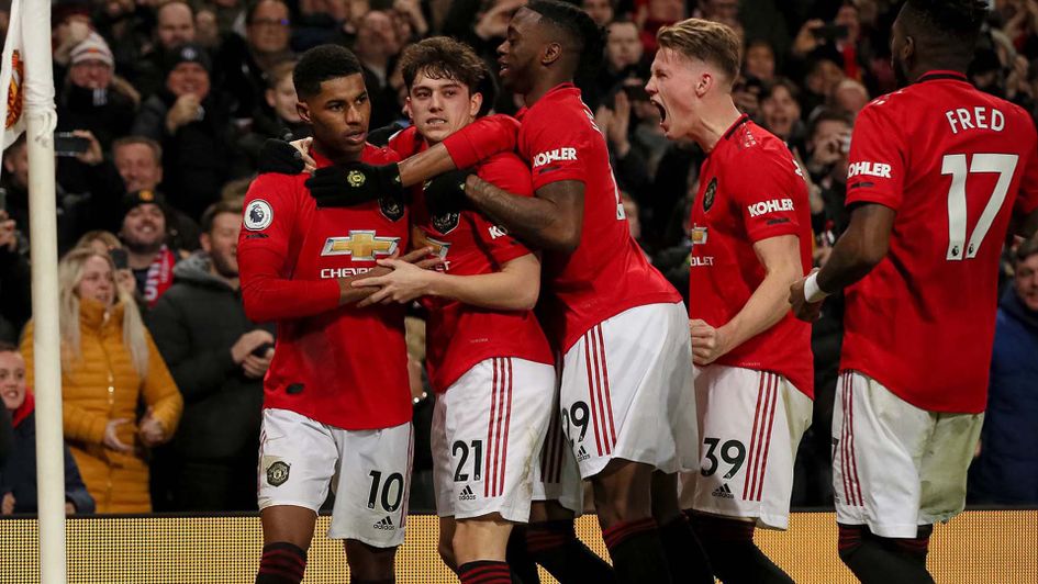 Mrcus Rashford celebrates scoring for Manchester United against Tottenham