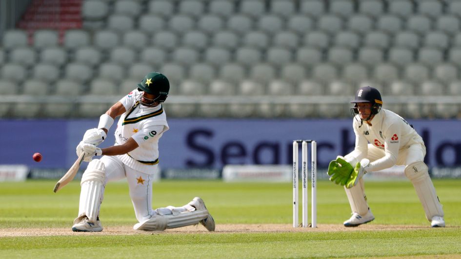 Pakistan's Shan Masood (left) hits one for six