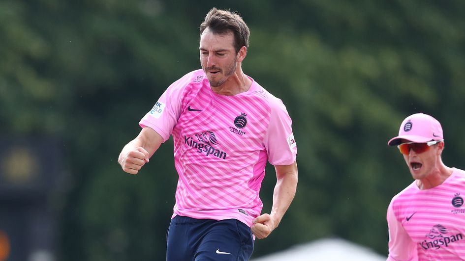 Toby Roland-Jones celebrates