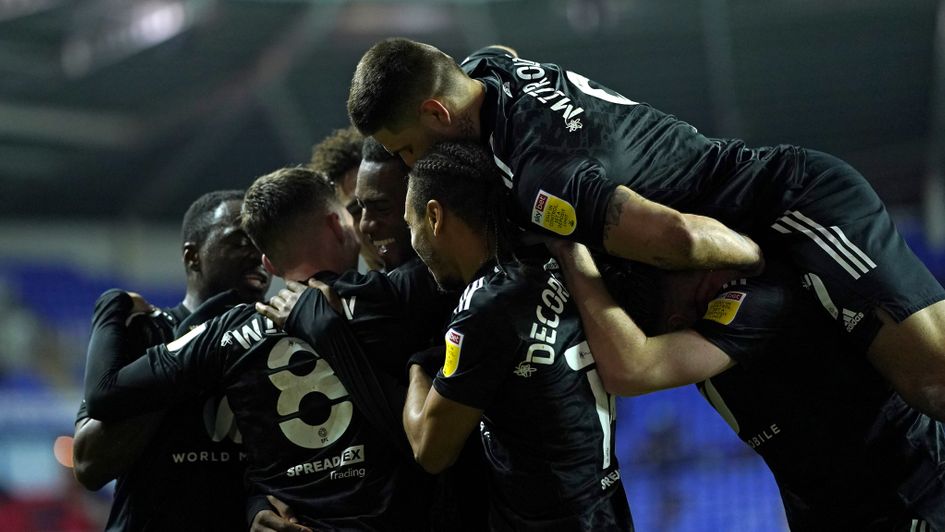 Fulham players celebrate at Reading