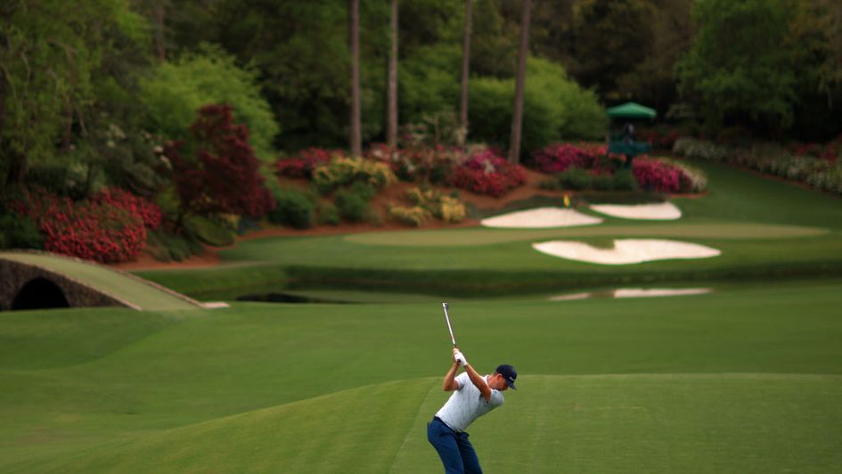 Justin Rose hits his approach shot to the 12th, where he made another birdie