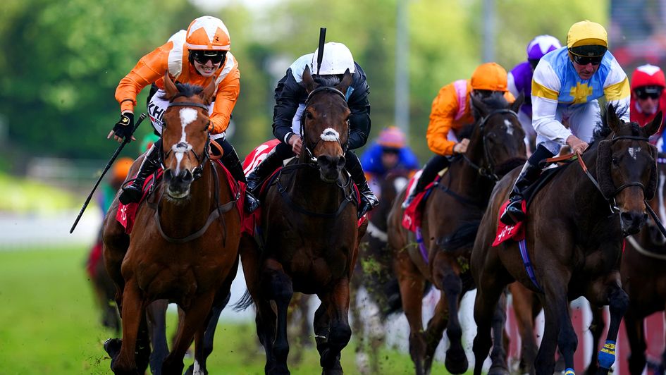 Metier (far left) swoops late to land the Chester Cup