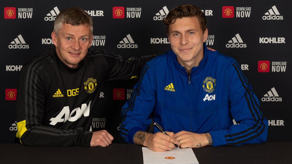 Victor Lindelof with manager Ole Gunnar Solskjaer