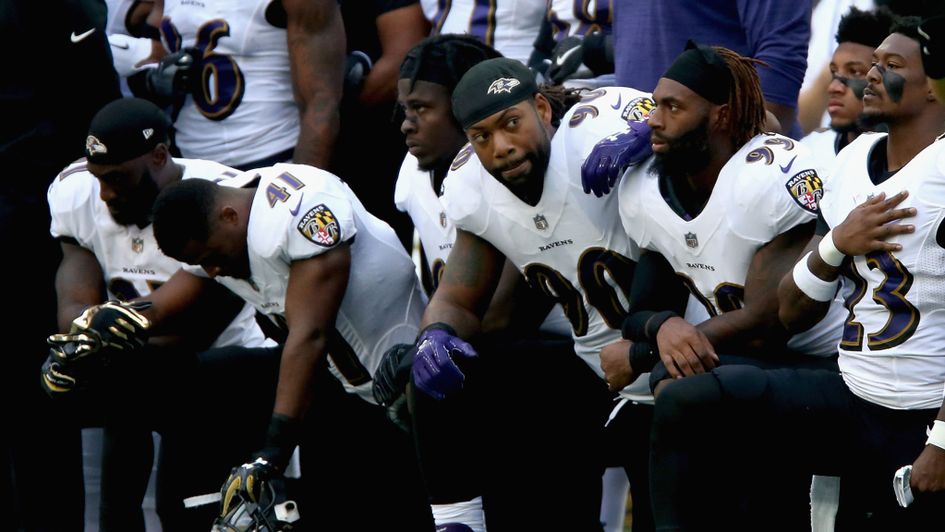 Baltimore Ravens players during the American anthem