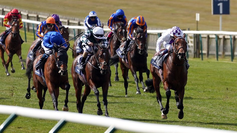 Poetic Flare (right) battles to victory in the QIPCO 2000 Guineas