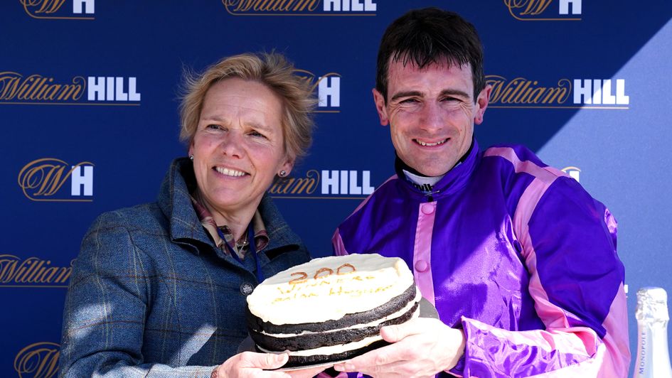 Brian Hughes is presented with a 200 cake at Perth