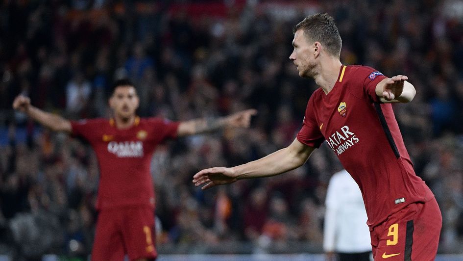 Edin Dzeko celebrates after scoring for Roma in the Champions League semi-final v Liverpool