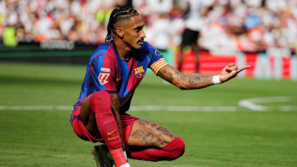 Raphinha celebrates scoring against Valencia at the weekend