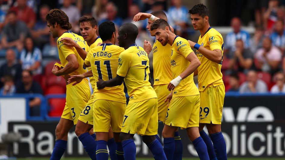 Chelsea celebrate as they beat Huddersfield away in the Premier League