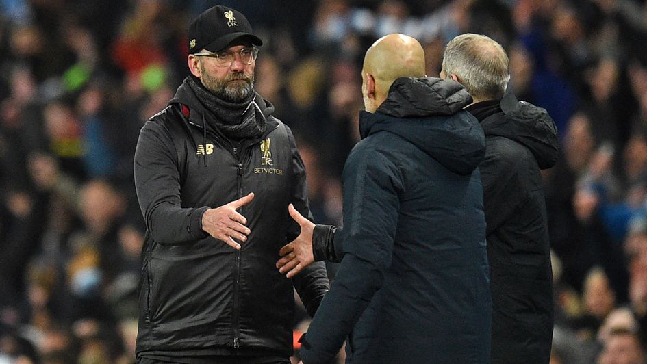 Jurgen Klopp and Pep Guardiola shake hands