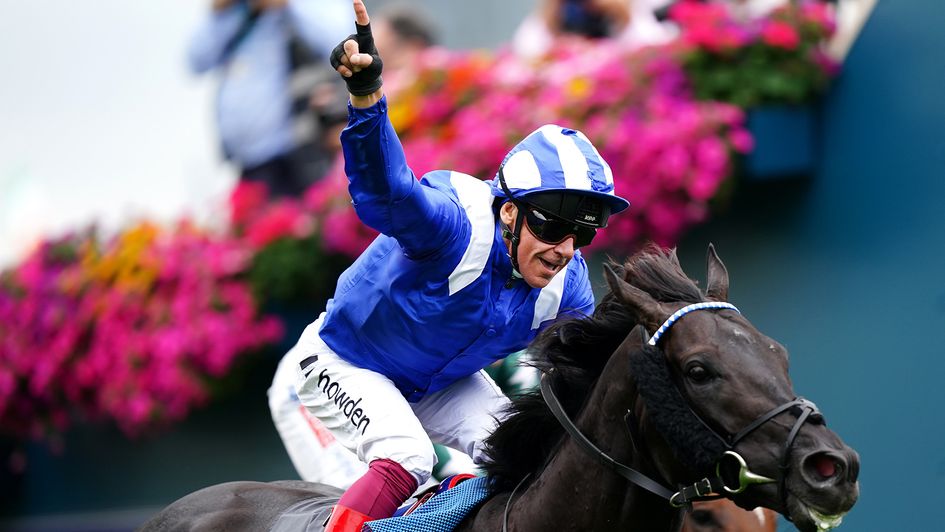Frankie Dettori celebrates on Mostahdaf