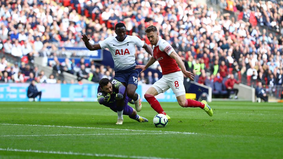 Aaron Ramsey rounds Lloris to open the scoring for Arsenal