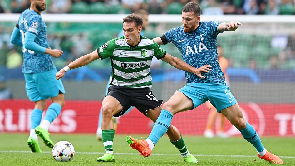 Manuel Ugarte battles for possession against Tottenham