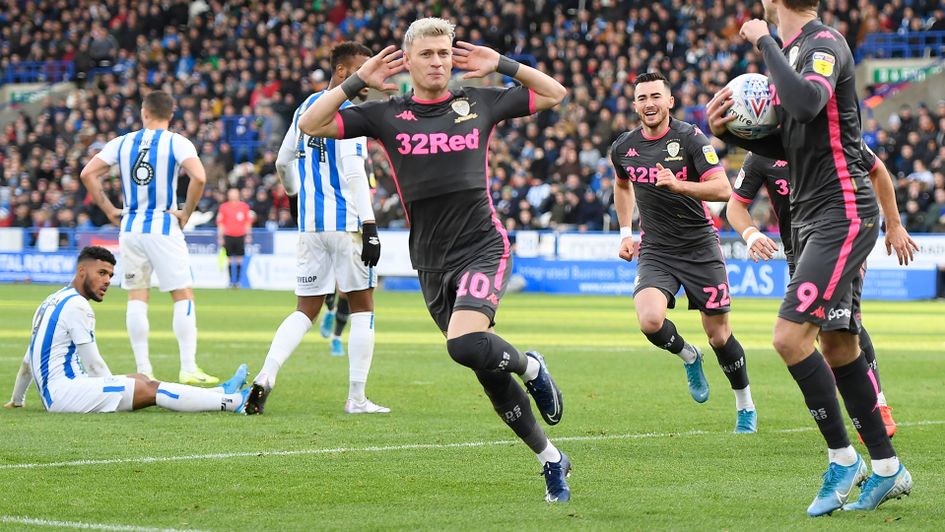 Ezgjan Alioski celebrates his goal against Huddersfield