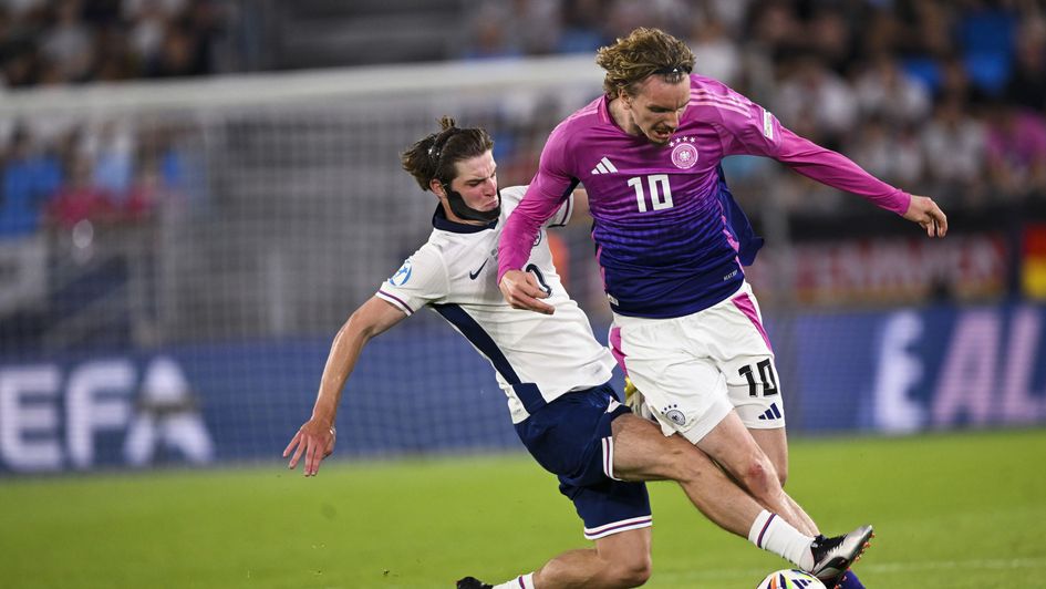 Alex Scott loves to get stuck in