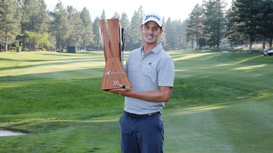 Andrew Putnam poses with the trophy on the 18th hole after the final round of the Barracuda Championship